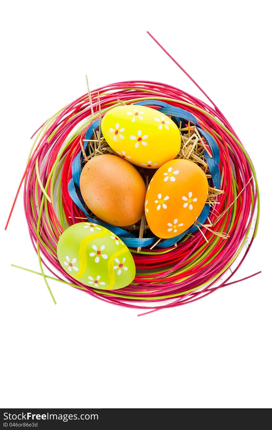 Easter background. Macro shot of painted eggs and easter decoration isolated on white background. Easter background. Macro shot of painted eggs and easter decoration isolated on white background