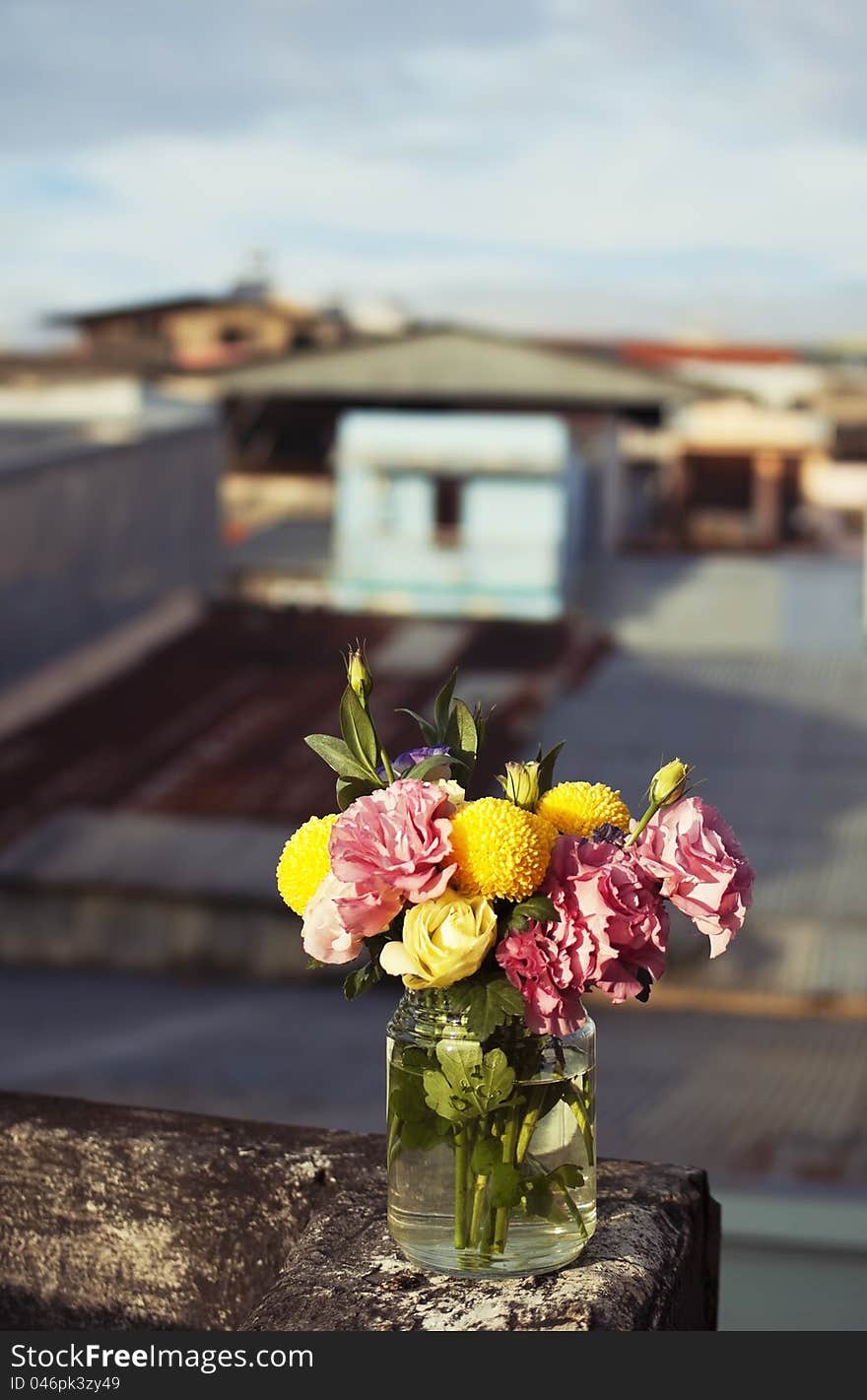 Bunch of flowers in a glass jar