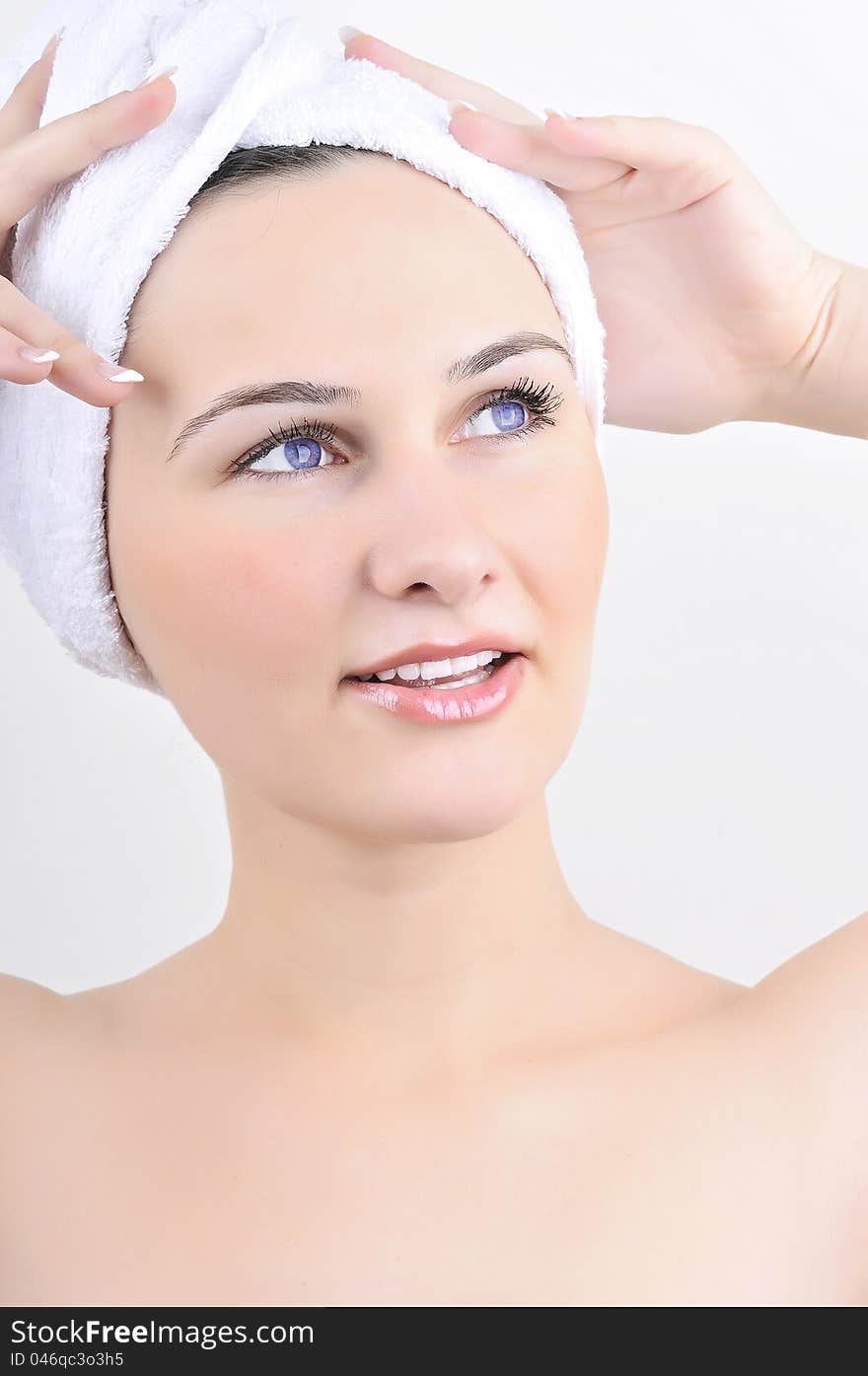 Beauty spa treatment woman wearing towel drying hair.