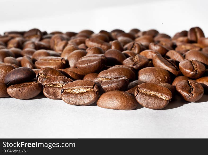 Lying coffee beans close-up