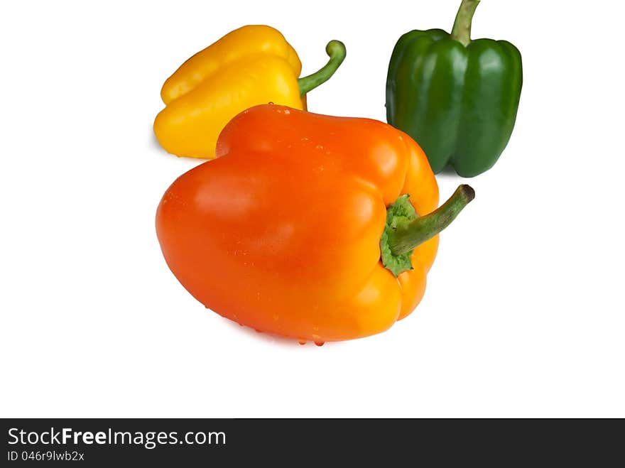 Orange paprica with droplet on a white background