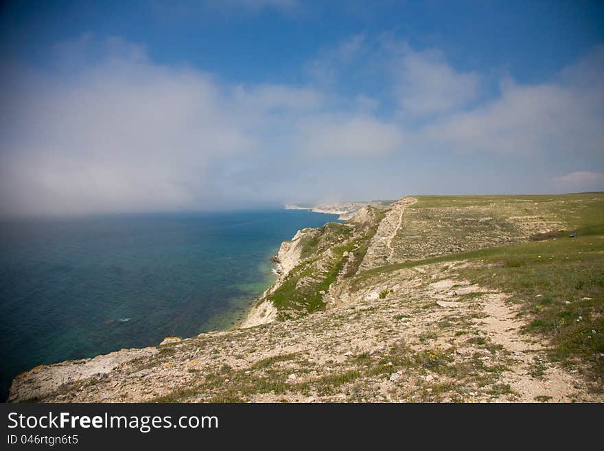 Landscpe of green hills and sea