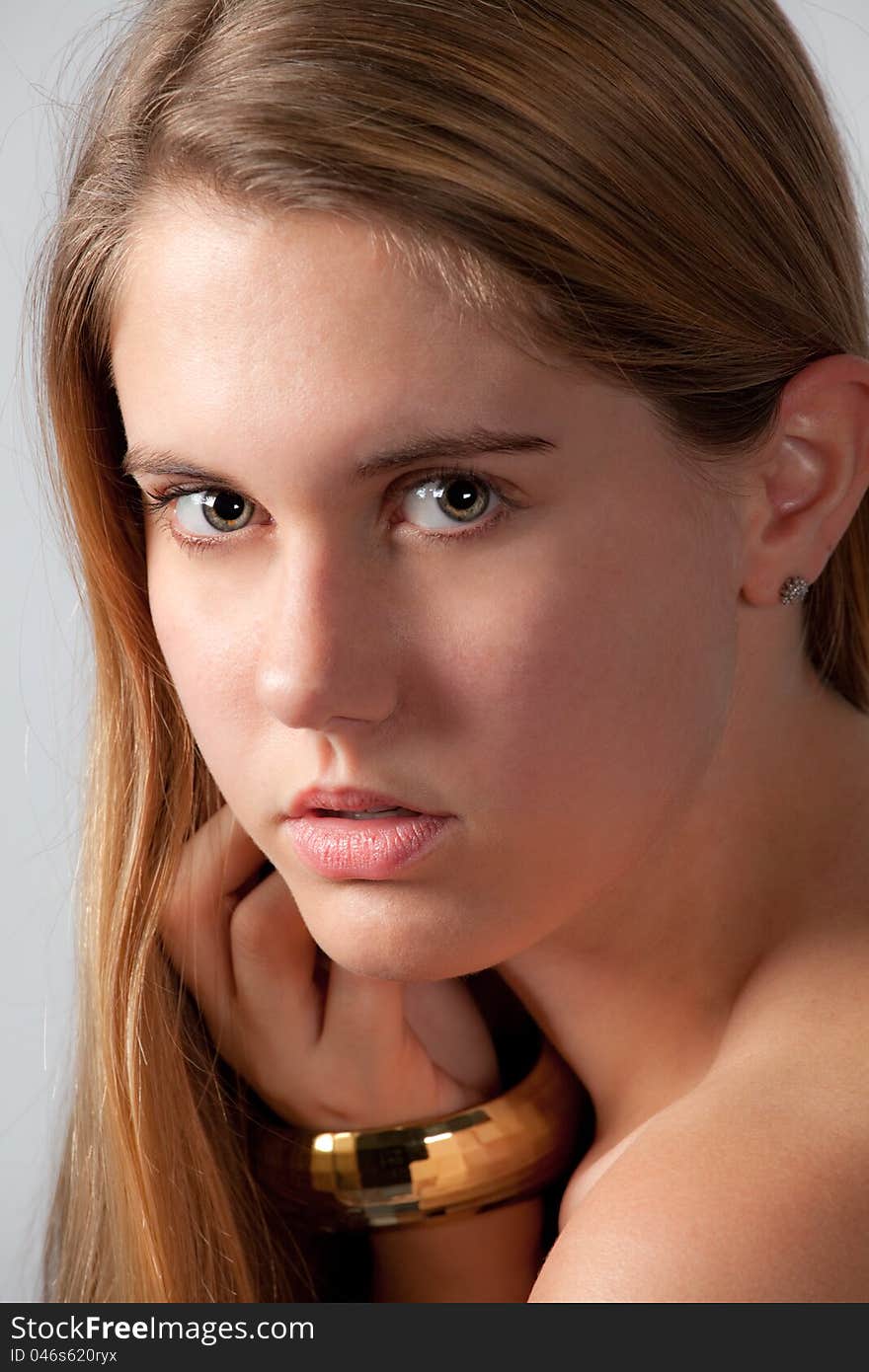 A portrait of a gorgeous young women gazing at the viewer. A portrait of a gorgeous young women gazing at the viewer