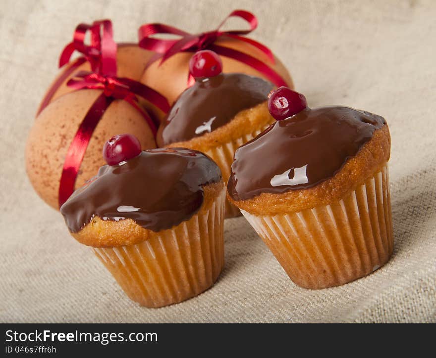 Cupcakes with chocolate icing and Easter Eggs. Cupcakes with chocolate icing and Easter Eggs