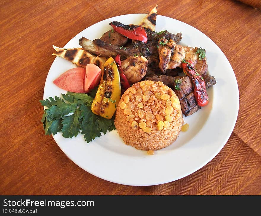 Pork barbecue and rice on Dish. Pork barbecue and rice on Dish