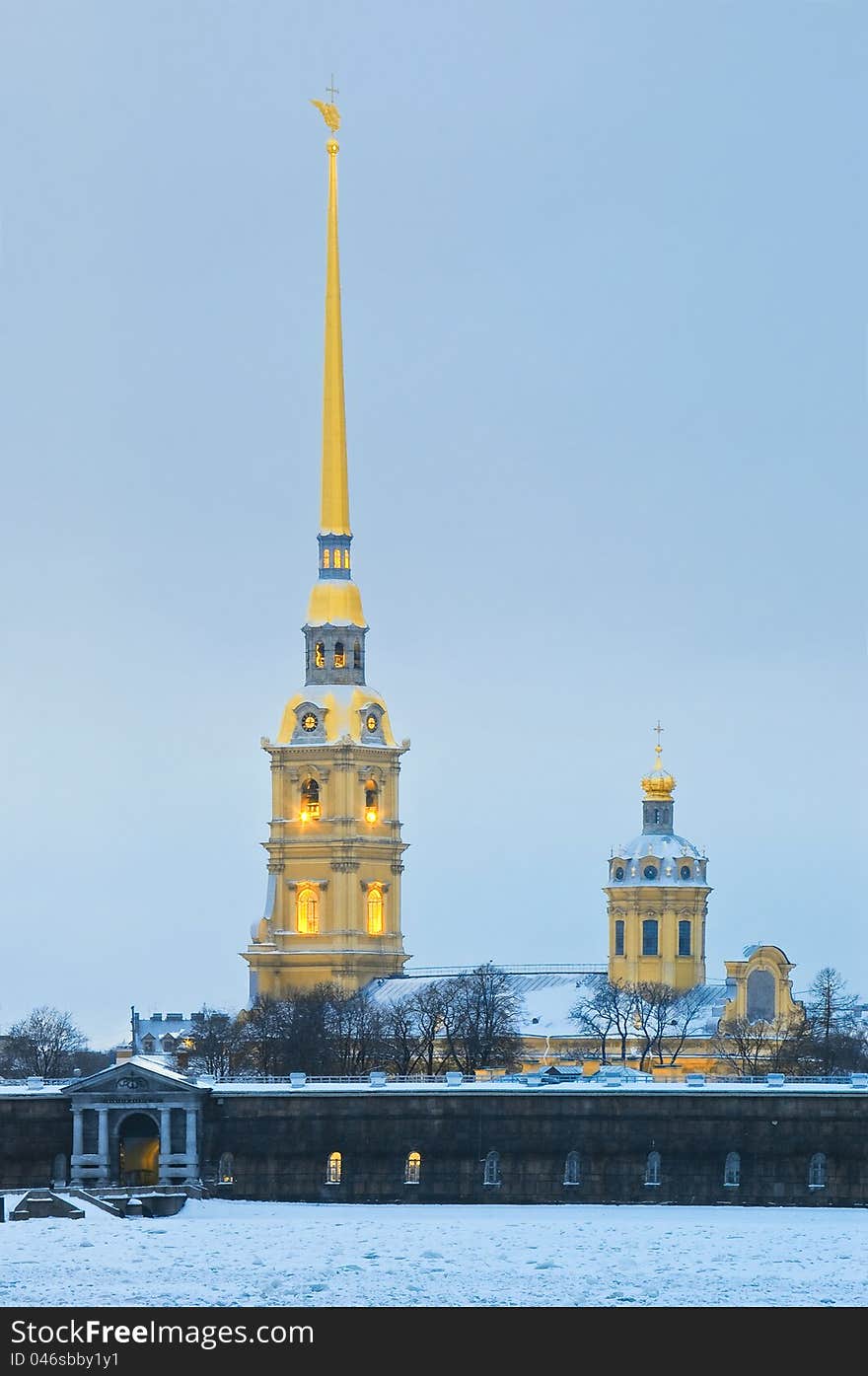 Peter and Paul Fortress and Cathedral in Sankt-Peterburg, Russia, on the coast of frozen Neva river. Peter and Paul Fortress and Cathedral in Sankt-Peterburg, Russia, on the coast of frozen Neva river