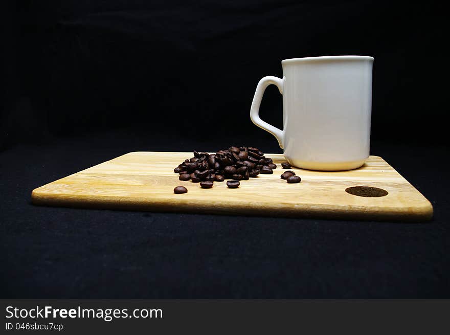 Coffee beans and cup