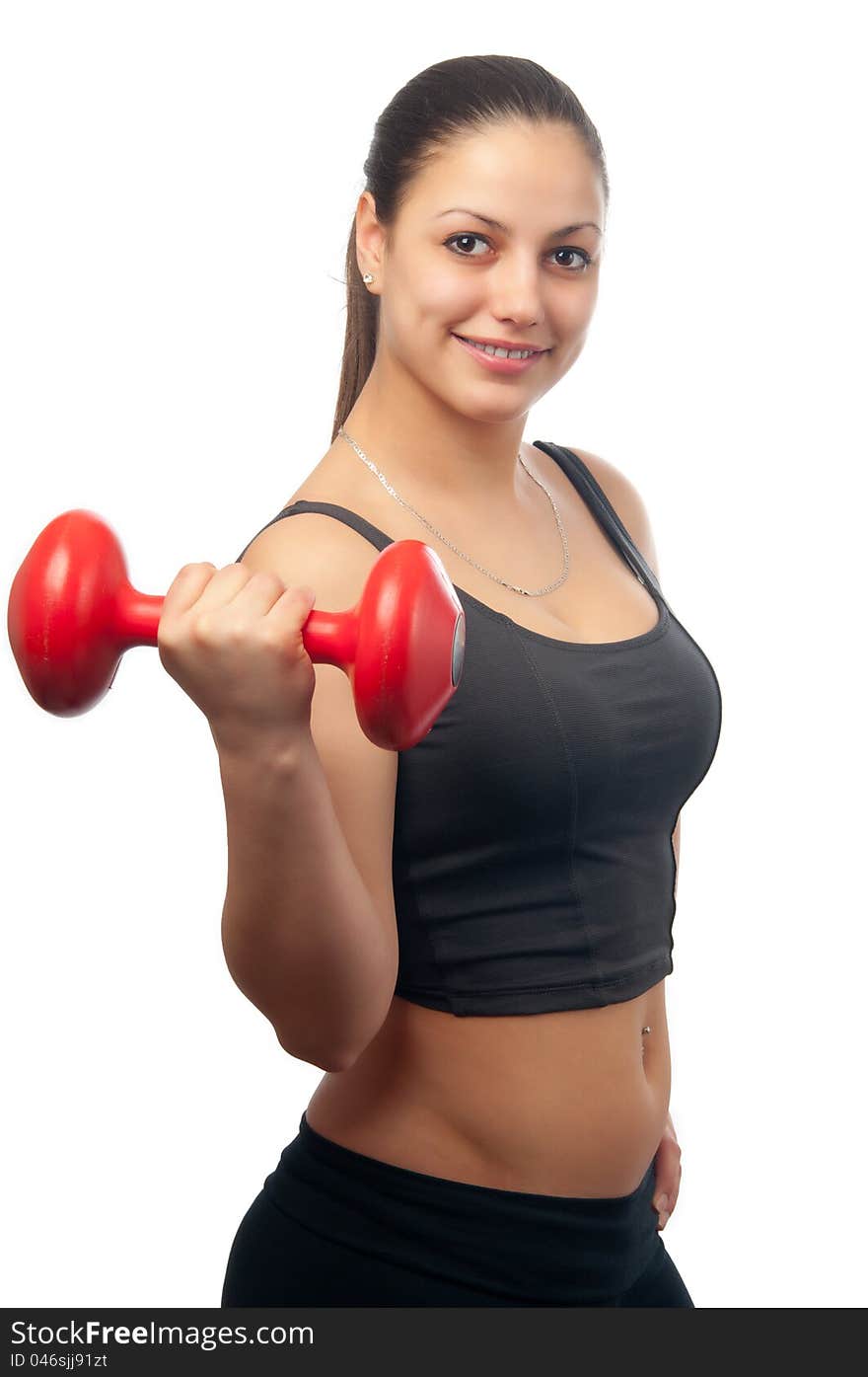 Young attractive woman exercising with dumbbell