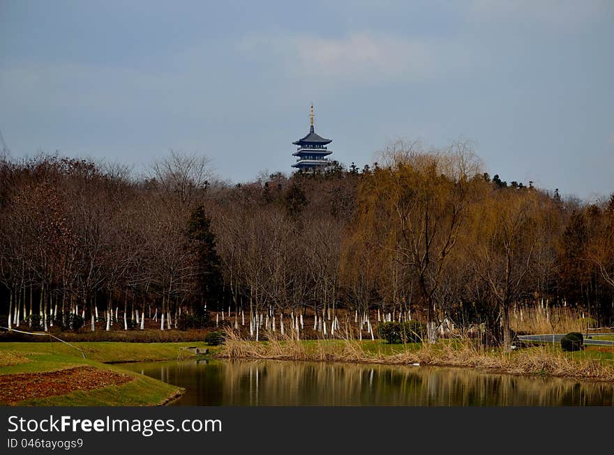 Tower and the lake，Taken in the near Jiangsu, China,In early spring morning