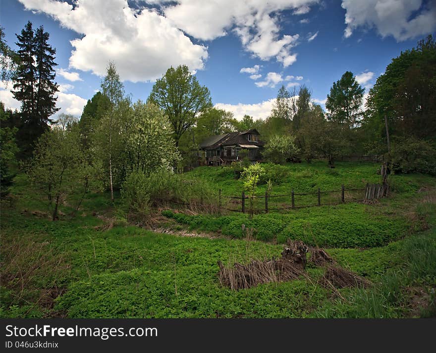 House in village spring sky