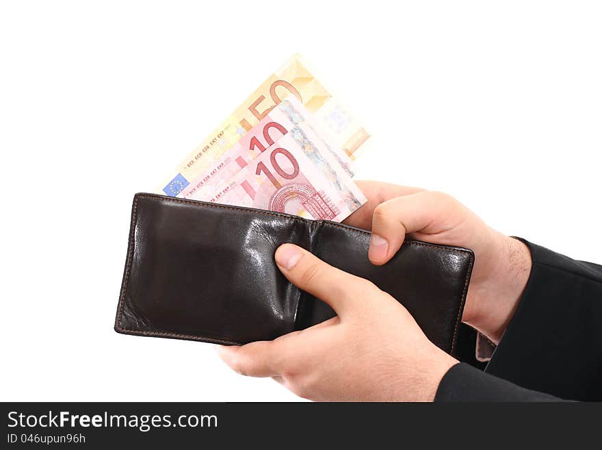 Human hands holding money out of a wallet. Human hands holding money out of a wallet