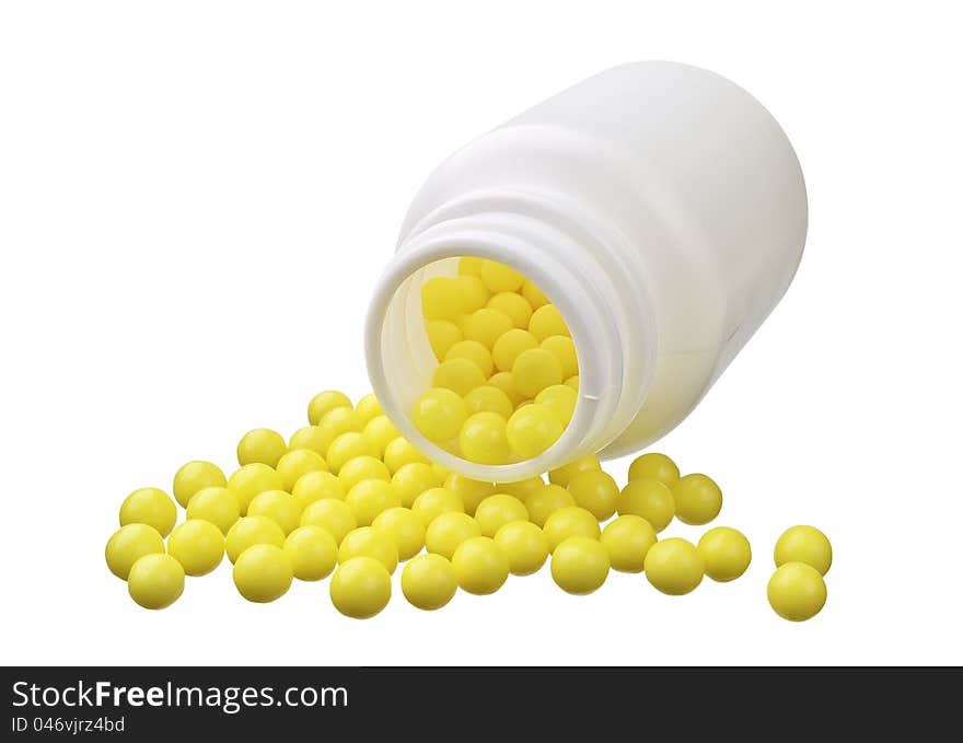 Pot of yellow vitamin isolated on a white background