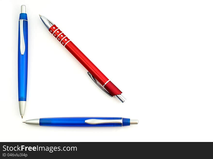 Red and blue pencil on white background