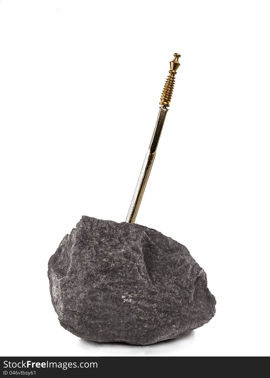 Medieval sword hammered in a stone on white background. Medieval sword hammered in a stone on white background