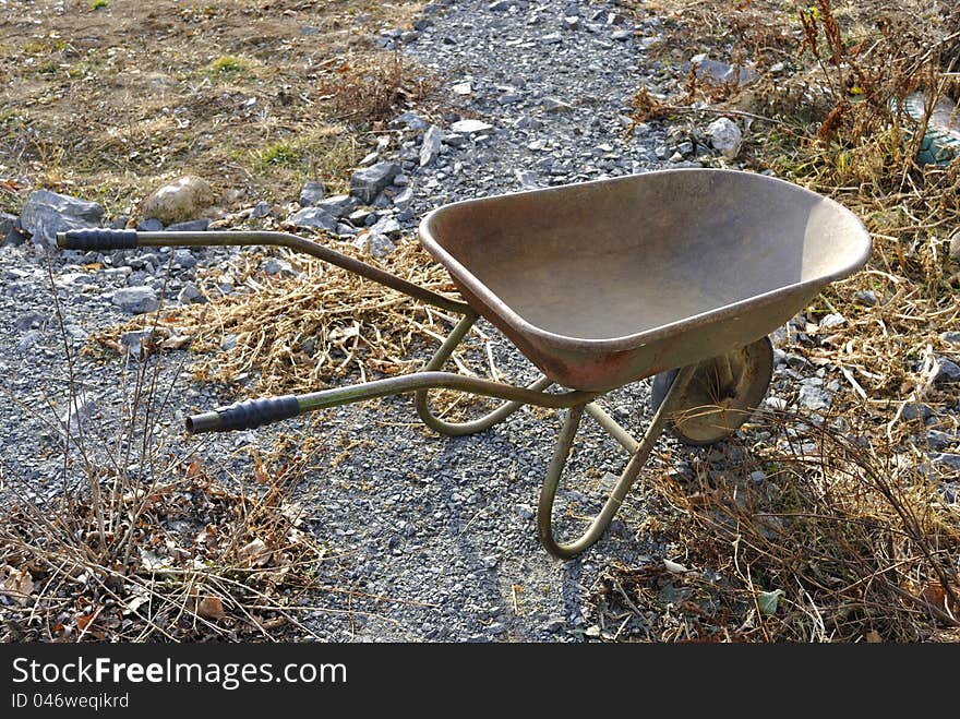 A hand barrow in the garden