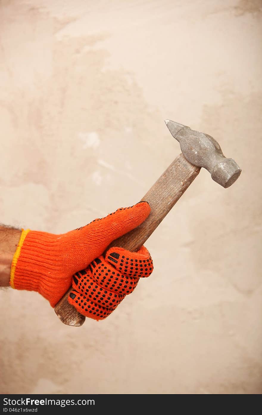 Hand with hammer