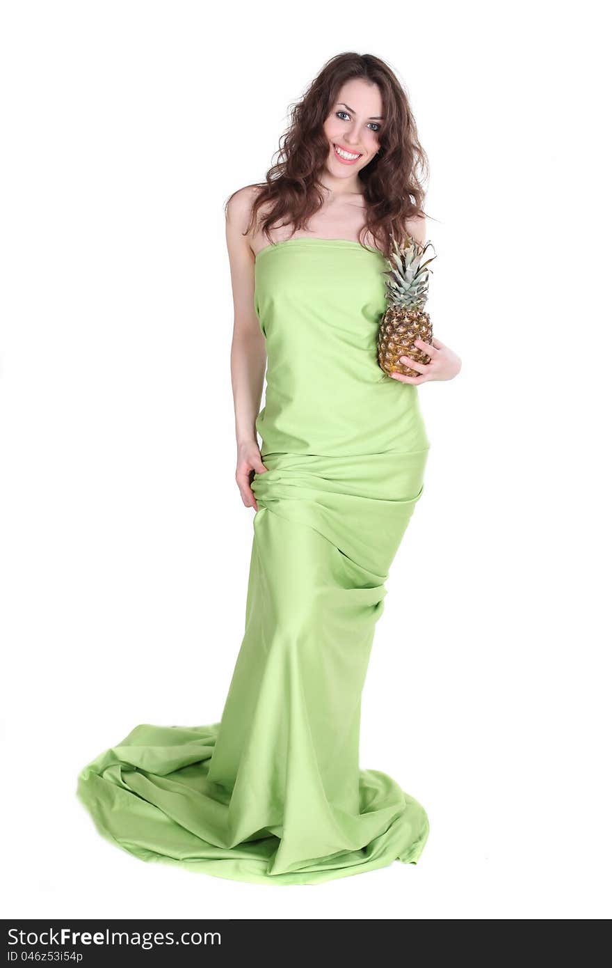 Young and healthy girl with pineapple in her hands isolated on white. Studio shot.