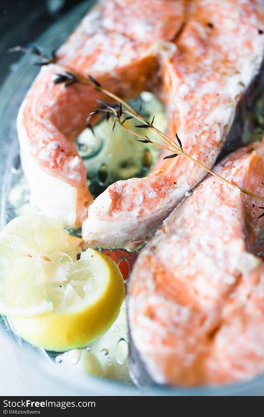 Boiled salmon fillet in a steamer