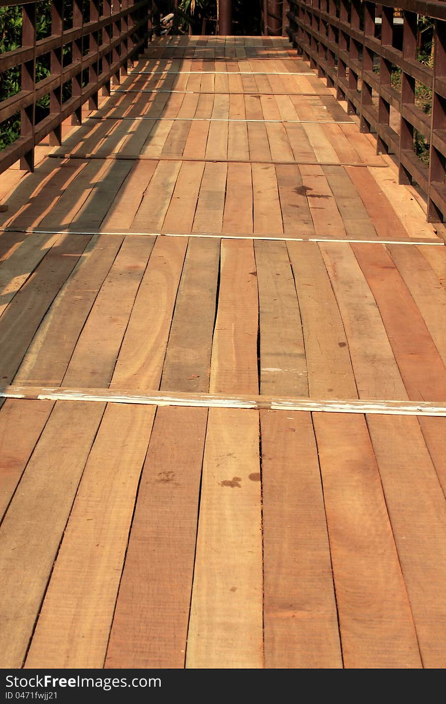 Wooden bridge traveler the forest. Wooden bridge traveler the forest