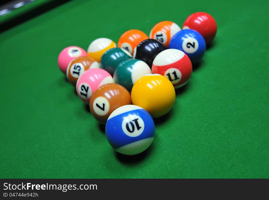 15-Ball rack of billiard balls on the desk. 15-Ball rack of billiard balls on the desk