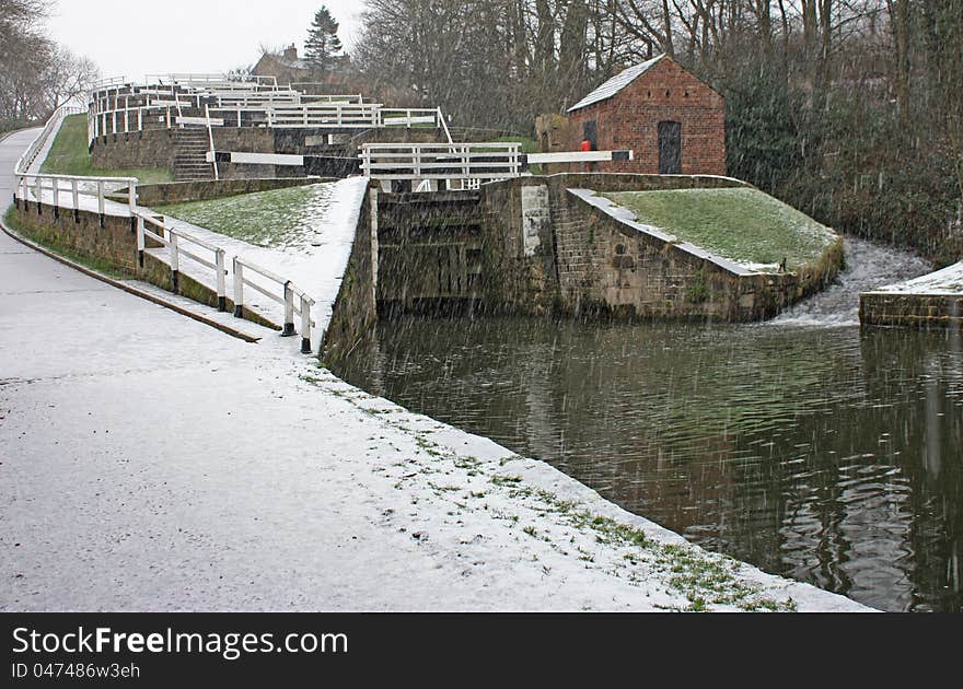 A Set of Canal Locks on a Cold Snowy Day. A Set of Canal Locks on a Cold Snowy Day.