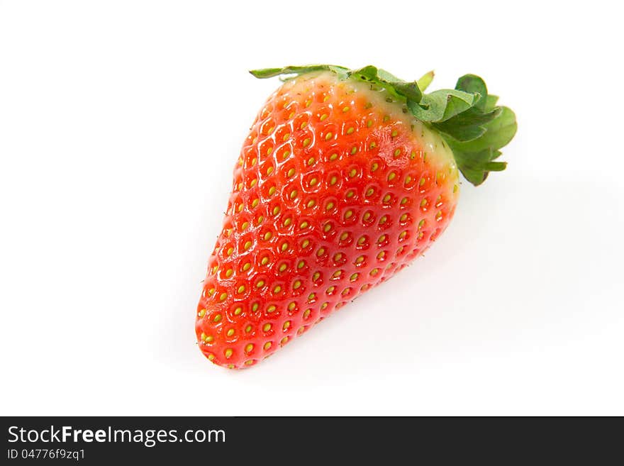 A picture of a single strawberry on a white background. A picture of a single strawberry on a white background