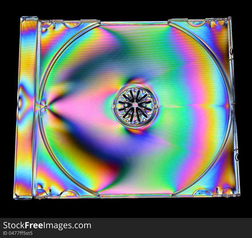 Color photo of cross-polarized cd case reflecting a rainbow of colors with a narrow black edge for cropping. Color photo of cross-polarized cd case reflecting a rainbow of colors with a narrow black edge for cropping