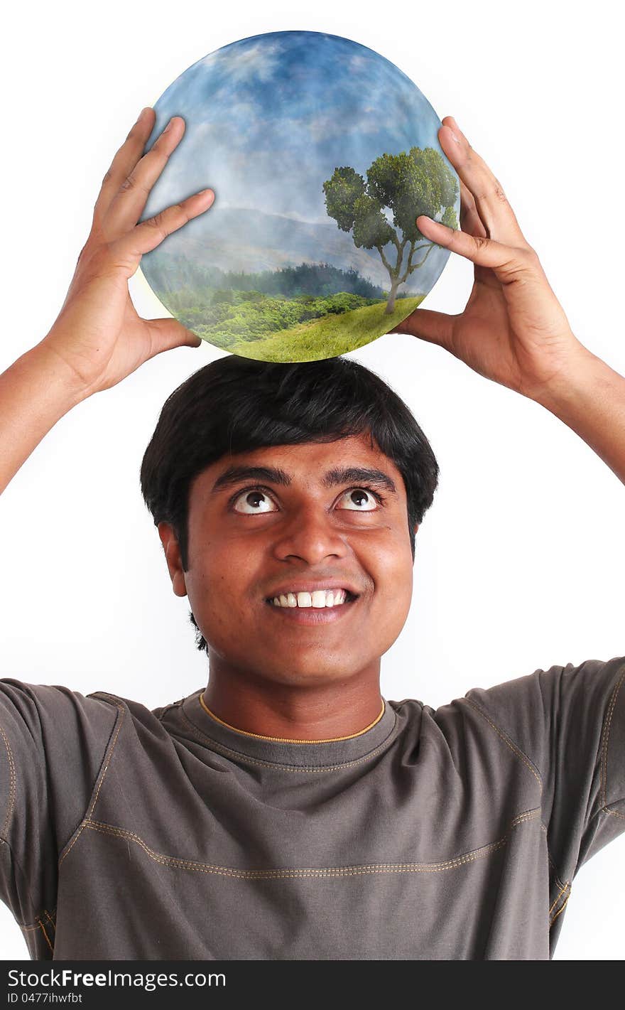 Person smiling and holding glowing ball containing ecosystem on the head. Concept of environment conservation. Person smiling and holding glowing ball containing ecosystem on the head. Concept of environment conservation.