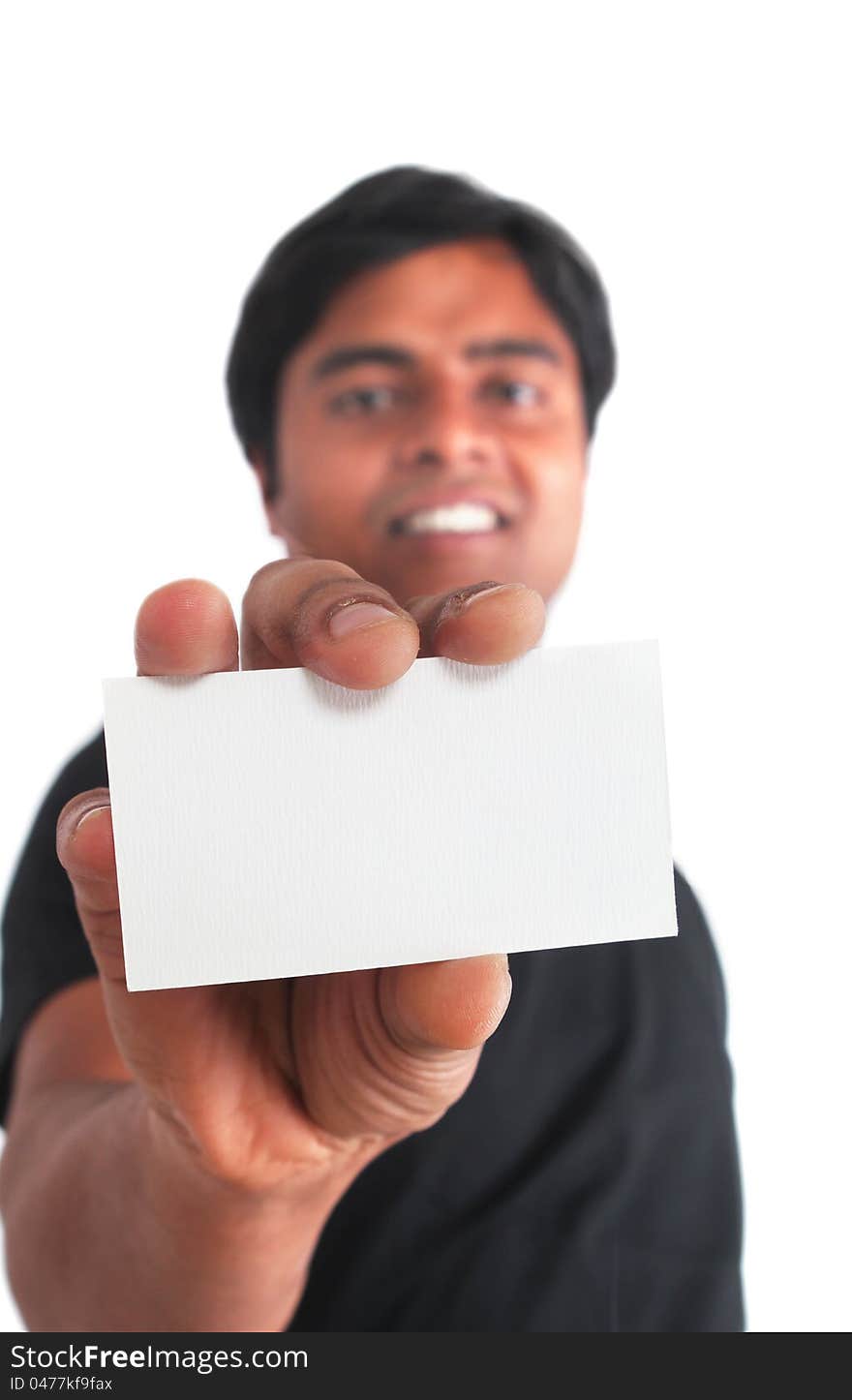 Indian young male holding business card on white background