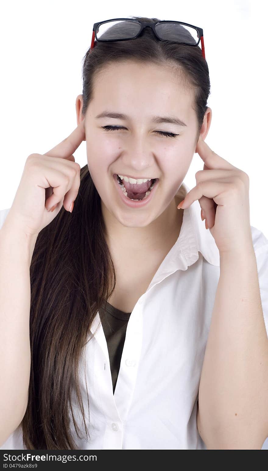 Young woman suffers from noise pollution, covers his ears.