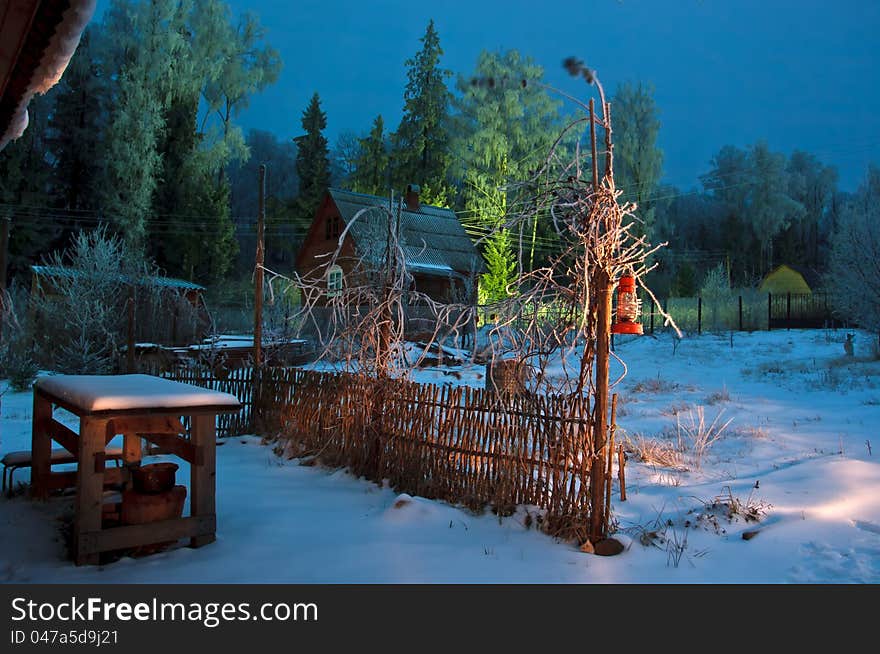 House in forest winter lantern