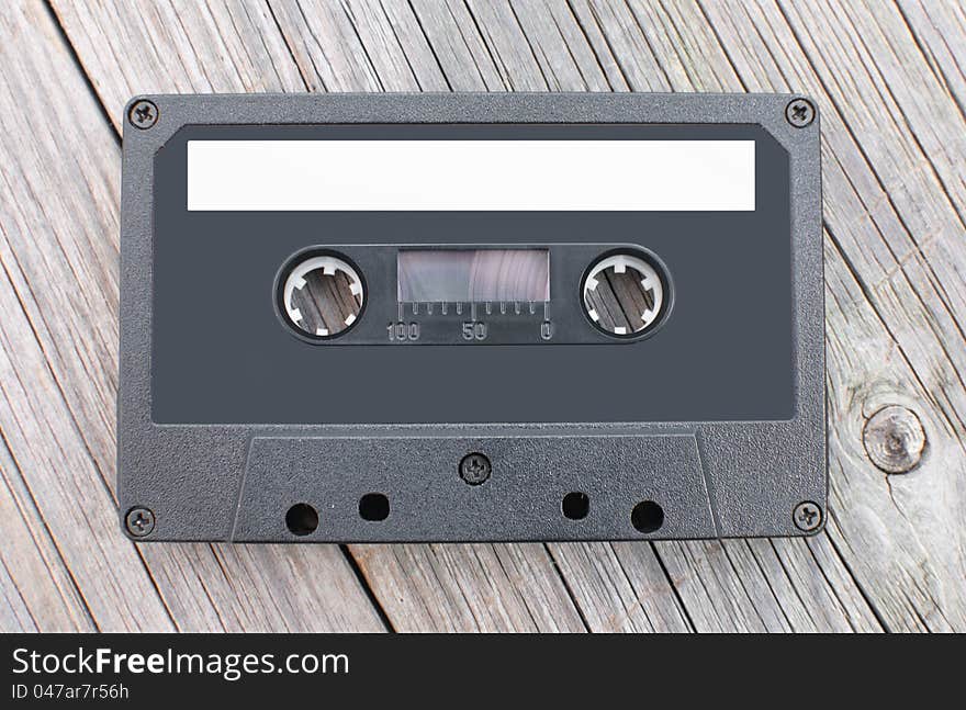 Old cassette tape with a blank label