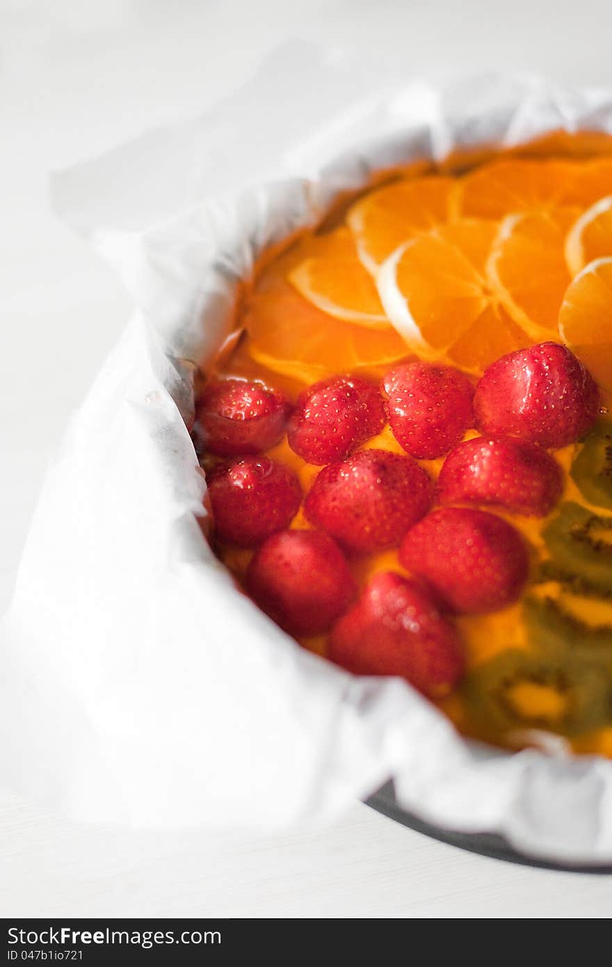 Strawberry, mango, orange jelly piece cake in table. Strawberry, mango, orange jelly piece cake in table