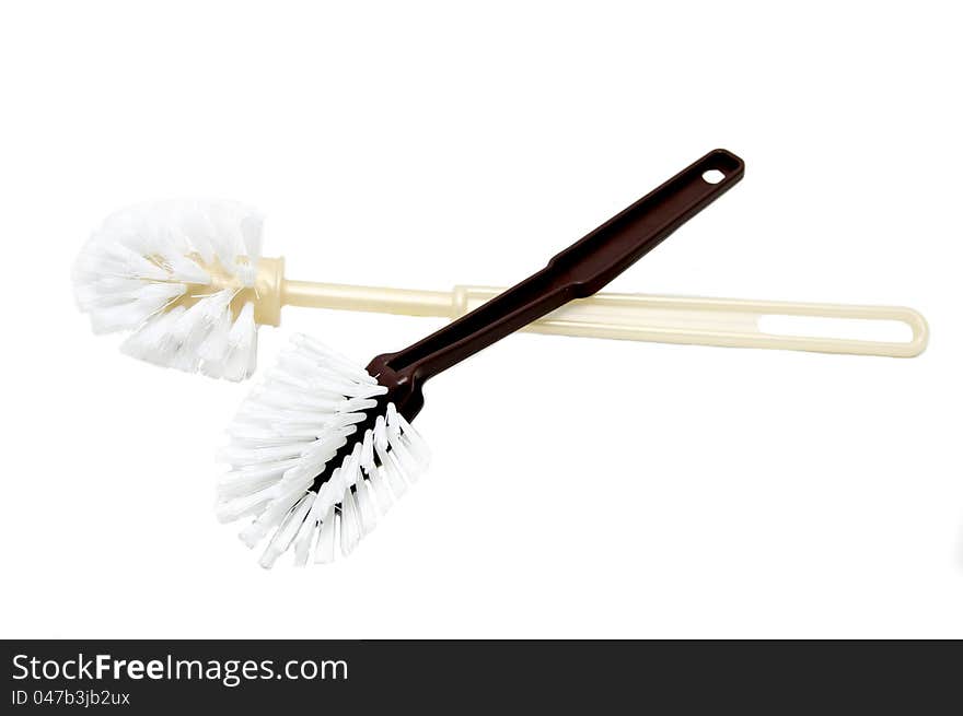 Two toilet brushes on a white background. Two toilet brushes on a white background