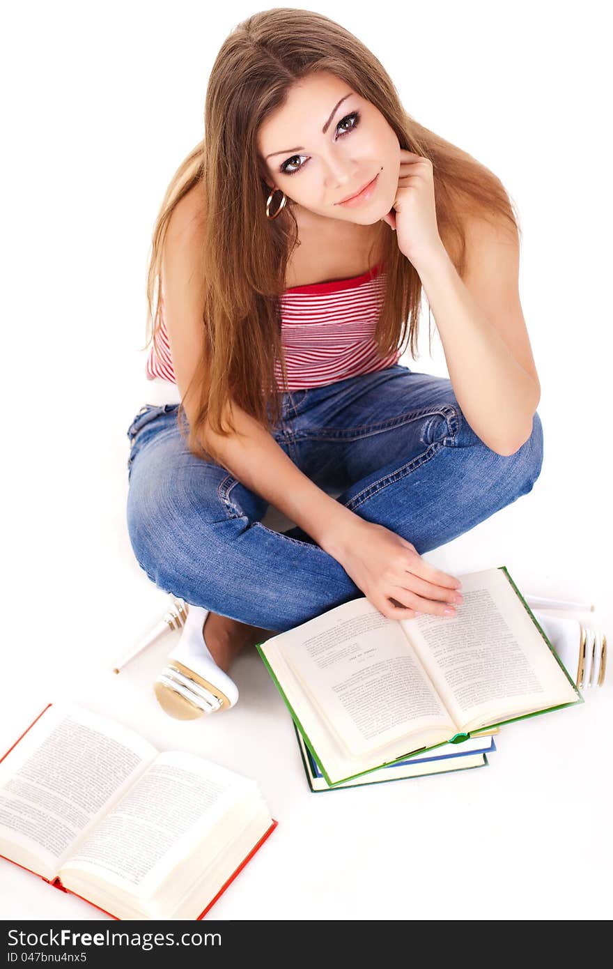 Student with a stack of books, isolated on white. Student with a stack of books, isolated on white