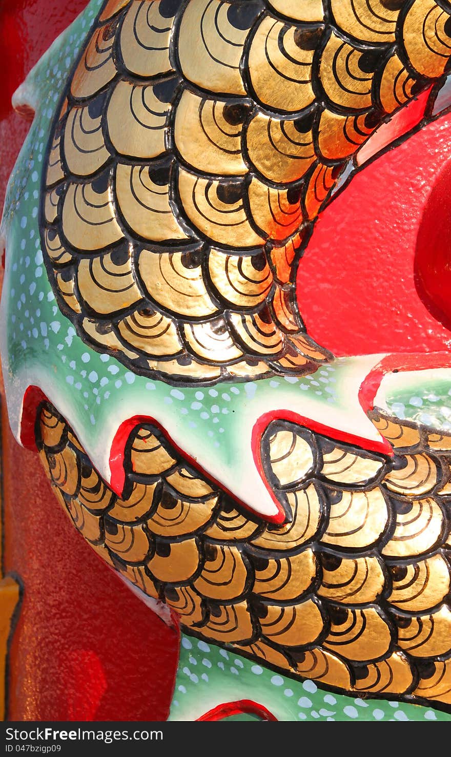 Chinese style golden scale of dragon on wall of shrine