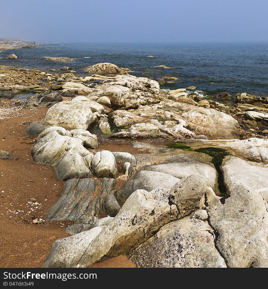 A corner of a beach near Taili harbor, Xingcheng, northeast China. A corner of a beach near Taili harbor, Xingcheng, northeast China.