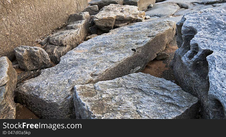 A pile of rocks on the beach