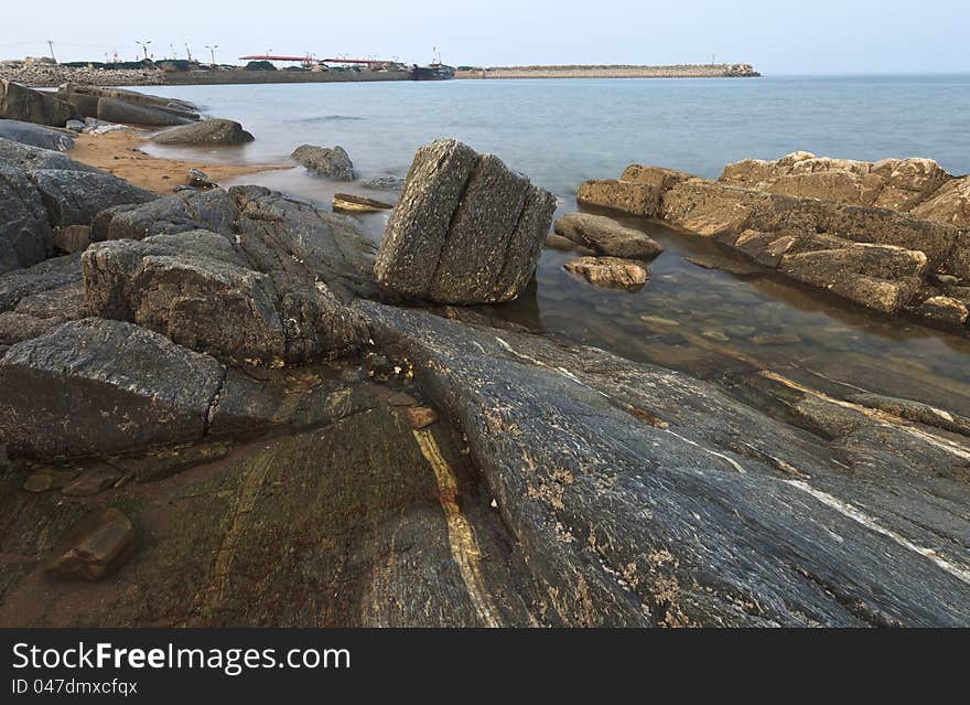 A corner of a beach near Taili harbor, Xingcheng, northeast China. A corner of a beach near Taili harbor, Xingcheng, northeast China.