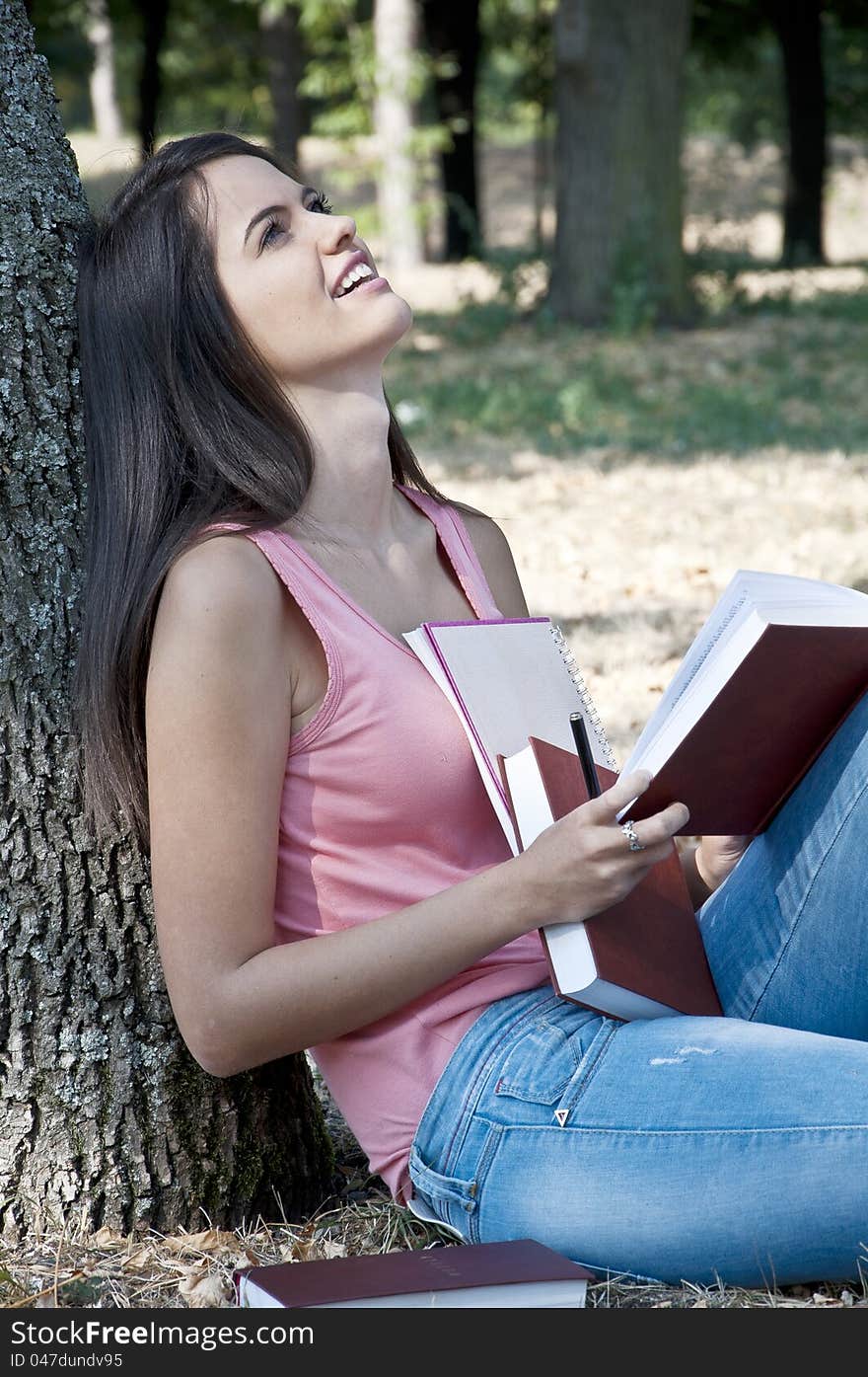 Young woman photographed in park. Young woman photographed in park