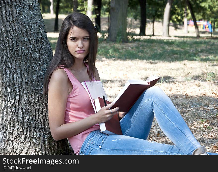 Young woman photographed in park. Young woman photographed in park