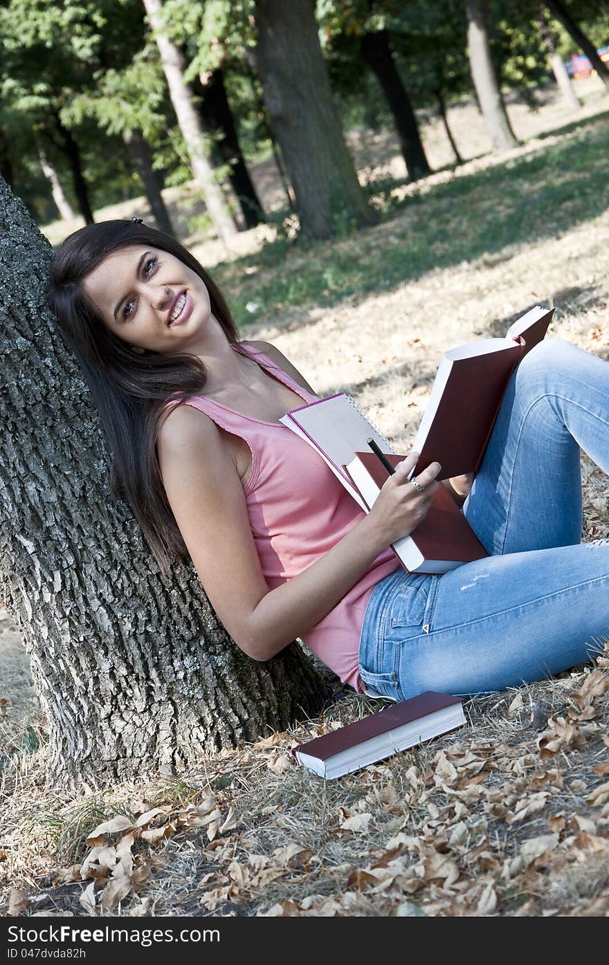 Young woman photographed in park. Young woman photographed in park