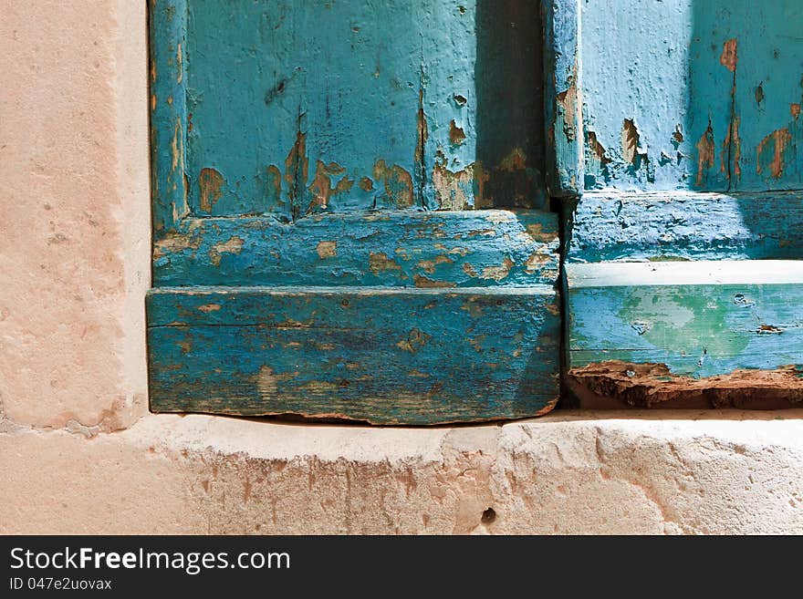 Old blue wooden door with peeling paint. Old blue wooden door with peeling paint