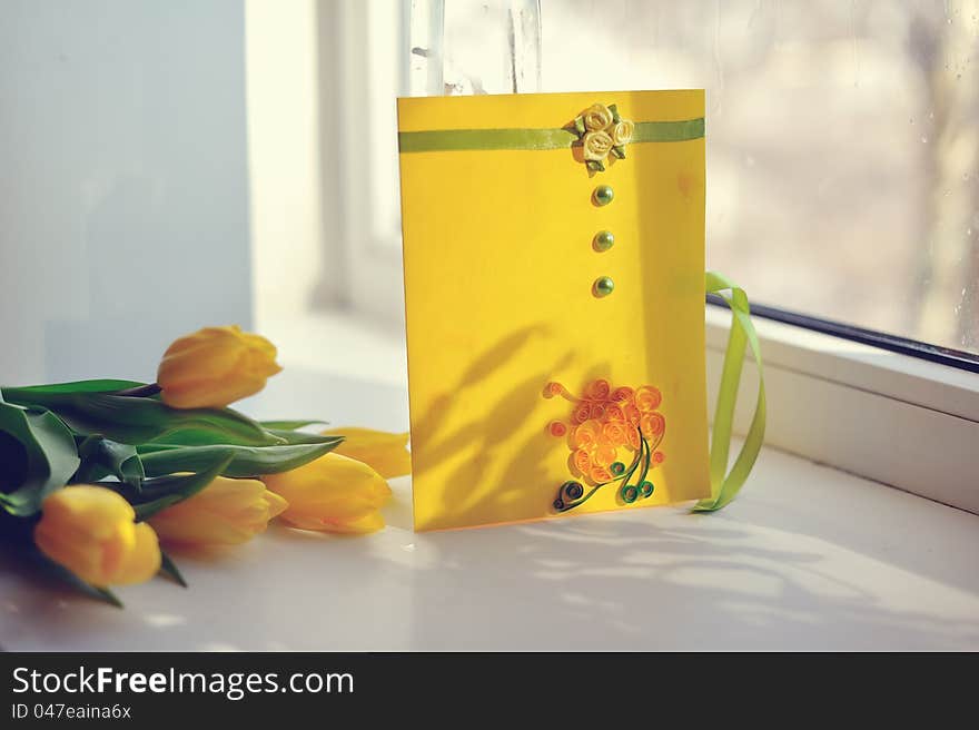 Gentle spring bouquet in a vase on a color cloth. Gentle spring bouquet in a vase on a color cloth