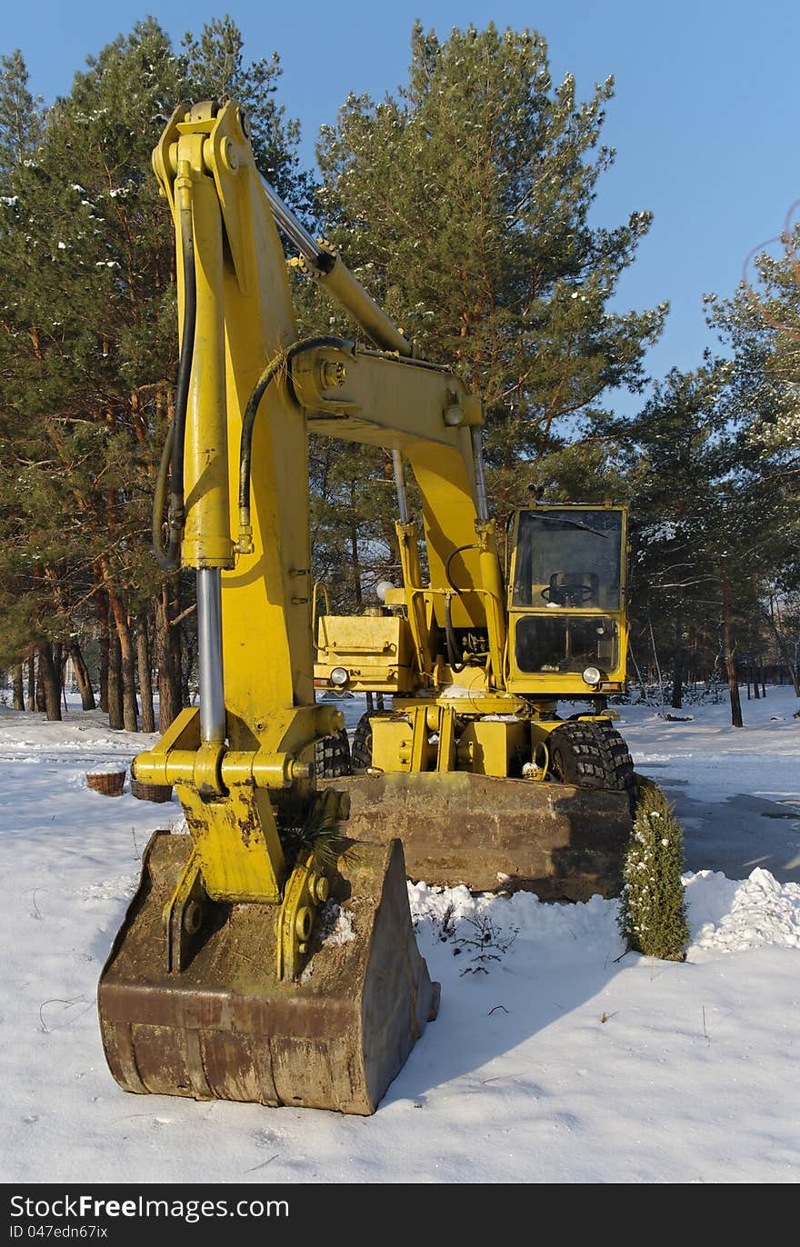 Excavator pictures winter sunny day