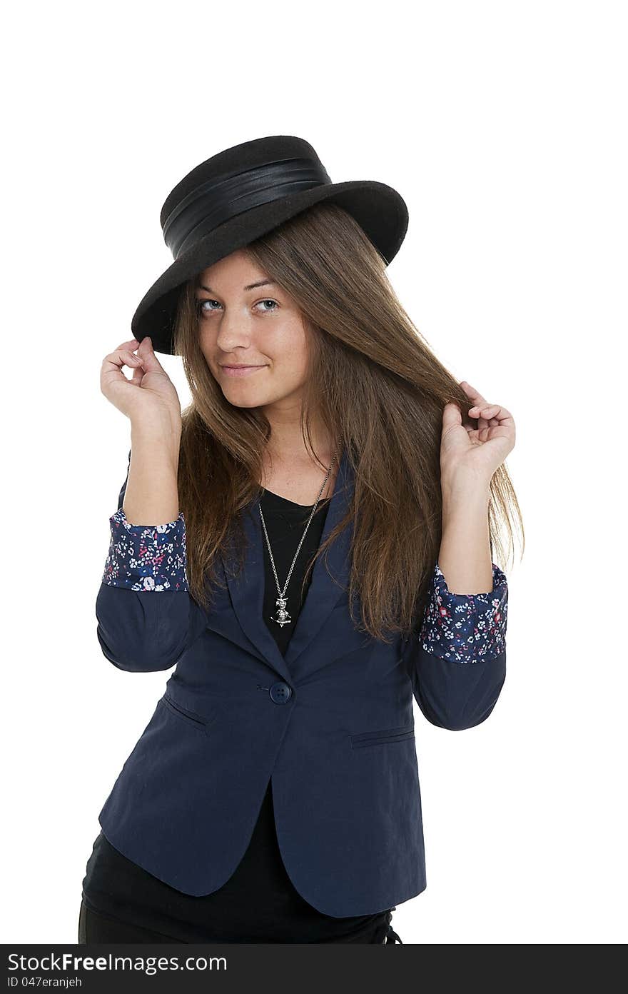 Young woman with hat, studio shot