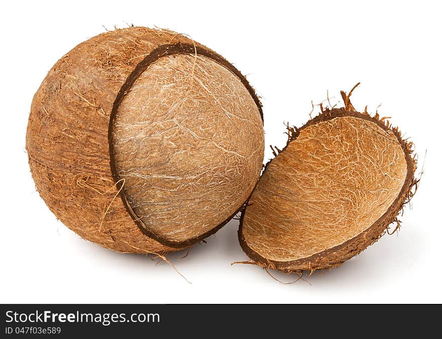 Cracked coconut against white background