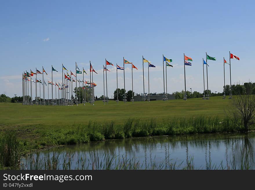 Flags of the world waving over blue sky,Royal Canadian mint,winnipeg,Canada