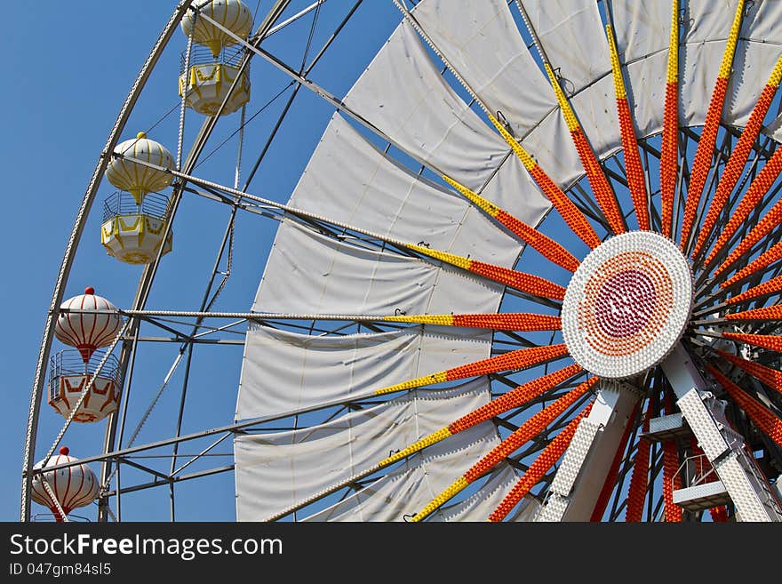 Ferris wheel and blue sky.