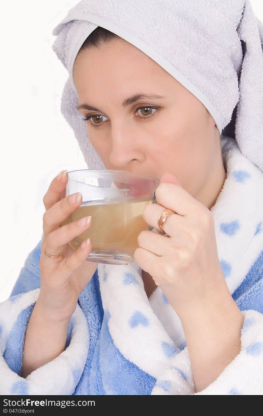 Woman In Bathrobe Drinking Tea